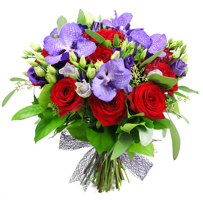 An opulent hand-tied bouquet by Flowers Highgate sits against a pristine white background, a lush blend of deep red roses and regal purple Vanda orchids. The broad, velvety petals of the roses speak of romance and luxury, while the orchids add an exotic touch with their striking speckled pattern in lavender and violet. Intertwined are clusters of lisianthus, their soft purple hues and tight buds contributing grace and depth. The arrangement is further enriched by a chorus of greenery-large, glossy leaves that deepen the palette and sprigs of finer foliage that suggest a growing, natural abundance. The stems are gathered neatly at the base and bound with a dark, almost black or deep plum-colored netted ribbon, lending modern elegance and a touch of texture to the presentation. This is a bouquet designed for anniversaries, Valentine's Day, Mother's Day, or as a luxurious gift to express admiration. It feels crafted for Highgate's celebratory moments, from the village to Archway and beyond, and it promises to brighten any room with its bold color story. Available for same-day delivery across Highgate and neighbouring areas, ensuring the gesture reaches quickly and warmly.