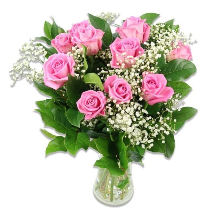 A clear glass vase stands centred against a spotless white backdrop, cradling a lush bouquet of pink roses and white baby's breath that seems to glow in the even studio light. Around ten to twelve pink roses form the main cluster, their petals unfolding in intricate layers, with each bloom offering a subtle gradient from pale, blush-pink outer petals to deeper, more vivid pink towards the centre. Some roses appear fully open, their rosettes broad and generous, while a few remain only partially opened, giving a sense of newly cut freshness and the gentle anticipation that accompanies the arrival of a baby. Woven through the roses, feathery stems of baby's breath introduce a cloud of tiny white blossoms, creating a delicate, airy contrast that lightens the visual weight of the roses and enhances the bouquet's sense of innocence, like the quiet paths around Highgate Cemetery shaded by mature trees. Surrounding the blooms, dark green rose foliage provides a robust, textured frame, the leaves slightly glossy and firm, helping to define the rounded shape of the arrangement and making the soft pinks and whites appear even more luminous. Through the transparent vase, the tidy green stems can be seen standing in clear water, a detail that emphasizes both the freshness of the flowers and the care involved in their preparation, much as you would expect from Flowers Highgate when crafting arrangements for local families. The lighting is soft yet bright, with no harsh shadows, allowing the velvety surface of the petals and the fine, branching structure of the baby's breath to stand out. The bouquet overall conveys warmth, tenderness, and a serene joy-an ideal floral expression for new baby celebrations, naming ceremonies, or simply adding a gentle blush of colour to a Highgate living room.