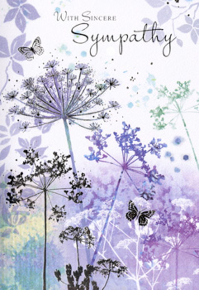On this sympathy card, the artwork unfolds like a meditative study in wildflowers, with the same tranquil mood you might find while standing in Waterlow Park, watching mist lift slowly from the lawns. A series of fine, elongated stems rise from the lower edge, their lines delicately curved and naturally irregular, as though sketched from life. Each stem ends in a cluster of umbelliferous blooms, detailed enough to reveal tiny branching spokes yet softened by translucent washes of colour. Violets, dusty lilacs, soft blues, and cool grey-greens overlap and blend, touching without ever clashing, creating a cool, calming palette that feels both modern and timeless. Some blossoms appear in sharper focus; others fade into semi-transparent silhouettes, hinting at a deeper meadow just beyond view. The background is a gentle fusion of muted purple and greenish-grey, applied in loose, fluid strokes that suggest distant hedges, low clouds, and filtered light without depicting any specific landscape. Among the flowers, a few butterflies drift, rendered with such lightness that their wings seem to shimmer rather than sit still. Their presence brings the quiet symbol of hope, continuity, and subtle transformation, offering comfort without sentimentality. The light across the scene is even and soft, as if the sun were veiled behind thin cloud over Highgate, giving every element a gentle, reflective glow. Above this serene floral tableau, a brief message of condolence appears in elegant, looping script, its tone formal yet deeply kind. Prepared with the same sensitivity that local florists put into funeral arrangements and sympathy deliveries across Highgate, this card offers a gentle visual embrace for those facing loss, honouring memories with simplicity and grace.