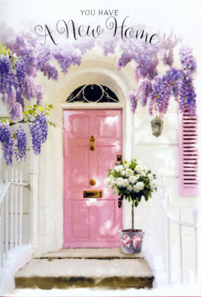 The image presents a tranquil doorway scene that feels perfectly at home in the leafy calm of Highgate, where old brick houses and climbing plants whisper stories of generations. At the centre stands a soft pink door, its pastel tone gentle yet confident, suggesting warmth and open-hearted welcome. The door is framed by whitewashed walls and a simply painted shutter, each surface catching the sunlight in a way that makes the entire entrance glow with quiet brightness. Above, wisteria trails in abundant lavender swags, the clusters of tiny blooms overlapping and tumbling like floral waterfalls. Their subtle purple shades blend from dusky lilac to pale, powdery violet, creating a canopy that both shelters and celebrates the doorway. The wisteria's leaves add touches of fresh green, and together flower and foliage throw delicate shadows across the steps, evoking the feeling of standing beneath shaded trees on a calm day in Highgate Wood. At ground level, a vintage-style grey tin bucket holds an opulent bouquet of white and cream roses, carefully arranged with a florist's eye for balance and texture. Each rose appears soft and velvety, their centres swirling with layered petals, some fully open and others in gentle bud. Sprays of fresh greenery curl between them, giving volume and a natural, garden-like ease. Around the bucket, a pink ribbon is tied in a simple bow, its hue echoing the door and tying the colour palette together in a soft, romantic chord. The scene hums with the emotion of new beginnings-a couple unlocking their first home near Highgate Cemetery, a family settling near the village square-and feels ideal for a new address announcement or a heartfelt card sending blessings for a beautiful life ahead.