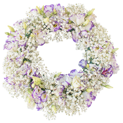 The image presents a beautifully balanced funeral wreath in a perfect circle, its composition a soothing pairing of white and soft purple flowers. Set against a plain white background, the wreath appears almost to float, every detail in sharp focus. The outer and inner edges are filled with abundant Baby's Breath, the tiny Gypsophila blooms creating a delicate, mist-like texture, as airy and light as the views over London from the slopes of Highgate. Woven through this snowy base are clusters of Lisianthus, their ruffled petals mostly white, with fine tracings and edges of lavender and violet providing gentle contrast. The purple tones are never harsh; instead, they softly tint the petals, adding quiet depth and sophistication. Some blooms are fully open and expressive, while others rest in half-open or bud form, with pale green and creamy tips that lend a sense of ongoing life and tender growth. The central space of the wreath is left open, forming a peaceful circle that naturally draws the eye inward and invites reflection. There is no visible greenery aside from the discreet stems, which keeps the overall palette clean, serene, and fitting for sympathy. This is the type of wreath a family in Highgate might choose for a funeral service, a memorial gathering near Waterlow Park, or a thoughtful graveside tribute. The crisp white background in the photograph emphasises the meticulous floristry work-the measured distribution of Lisianthus, the even spread of Baby's Breath-so that the finished design feels both artistically composed and deeply respectful.