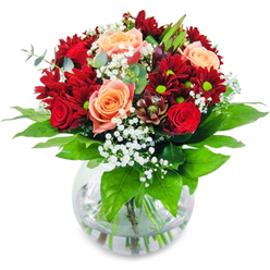 Imagine cradling this exquisite bouquet, lovingly assembled by Highgate's craft florists, and inhaling the cool morning scent that mirrors the breezes drifting through Highgate Woods. Velvet-red roses and lush chrysanthemum heads invite admiration, their colours rich and bold as autumn sunsets over Archway Road. Amidst these, peach and apricot-hued roses add gentle warmth, lighting the bouquet with a soft radiance that soothes and uplifts. Delicate gypsophila, like a scattering of tiny snowflakes, floats lightly among the blooms, bringing an airy grace reminiscent of a spring morning near Pond Square. The arrangement's stems are visible in clear water, amplifying the bouquet's natural freshness and life, as robust greenery circles the base with energy and a subtle forest aroma. Every stem is thoughtfully chosen and expertly placed to create a perfectly balanced presentation, ideal as a centrepiece on a Highgate dining table for birthdays, special moments, or a quiet evening celebration. The subtle fragrances drifting from the bouquet evoke the greenery and floral sweetness familiar to Highgate, inviting joy and a sense of occasion with every glance.
