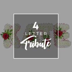 This image presents an elegant illustration of a four-letter floral tribute, the kind of personalised funeral arrangement often seen at Highgate services and memorials held near the cemetery or along the leafy streets that climb towards the village. A semi-transparent dark grey square dominates the centre, bordered by a fine white frame and resting against a serene, light grey background. On this central panel, white text spells out "4 LETTER" in a modern, upright font, while the word "Tribute" glides beneath in a graceful script, giving the design a balance of clarity and warmth. Behind this overlay and breaking out from its sides are four large, three-dimensional floral letters, shaped to form a chosen name or affectionate word. Each letter is lavishly coated in compact white chrysanthemums, their tiny petals overlapping to create a thick, soft carpet of blooms that suggests purity and peace. Delicate pale pink ribbon edges the contours of the letters, just visible through the flowers, adding a gentle blush tone that feels understated and comforting. Punctuating the white base are carefully placed clusters of velvety red roses, accompanied by fresh green foliage that may include fern or ruscus, the leaves' natural sheen enhancing the richness of the reds. Although the dark grey square partially veils the centre of the tribute, the bold colour of the roses and the hints of greenery are still very much in view, creating a direct visual link between the textual description and the floral craftsmanship beneath. The overall layout is calm and uncluttered, focusing attention on the idea of a customised sympathy tribute in floral letters, suitable for funerals, wakes, or crematorium services around Highgate, and easily tailored for local delivery to nearby addresses and chapels.