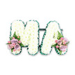A dignified floral tribute spells out the letters MA in large, clear capitals, presented against a bright white background that sets off the floral work. Each letter is entirely covered with pristine white chrysanthemums, their rounded blooms packed tightly together. The petals of the chrysanthemums overlap in multiple layers, creating a soft, cushion-like appearance that feels gentle and comforting, as if the flowers are offering a quiet embrace. Encasing the outer edge of the M and A is a dark green satin ribbon, folded into small pleats that follow every curve and straight line. This deep green outline frames the white florals and brings a sense of composed elegance, evoking the leafy character of Highgate, with its tree-shaded streets and green spaces. At the base of the left leg of the M and the right leg of the A, two symmetrical accent arrangements introduce a subtle wash of colour. Each cluster showcases soft pink roses and pale lilac roses, their petals silky and gently spiralled, supported by smaller pink spray roses that add detail and volume. Airy fern fronds and touches of foliage emerge from beneath the roses, lending a natural, slightly wild edge, reminiscent of ferns and undergrowth in nearby Highgate Wood or along the paths in Waterlow Park. The tribute feels thoughtful and intimate, ideal for a funeral service, cremation, or memorial gathering in the Highgate area. It visually expresses the love and gratitude held for a much-missed Ma, combining traditional white sympathy flowers with soft, comforting pastel tones and careful, professional floristry.