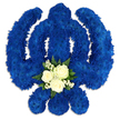 A large Sikh Khanda floral tribute is displayed against a bright white background, its familiar shape recreated in luxurious royal blue flowers. The circular chakkar, strong central sword and two outward-sweeping kirpans are all built from countless small chrysanthemum heads, packed together so firmly that they form a continuous, plush surface. The blue colour is rich and saturated, conveying both dignity and calm, and the careful shaping of the flowers gives the emblem sharp definition and symmetry. The way the light brushes across the petals reveals subtle shifts in texture, suggesting the tribute's thickness and the florist's skilled hand in layering each bloom. At the base of the central blade, a compact cluster of white and green flowers creates a gentle point of focus. Three white roses rest together, fully opened but still fresh, their smooth petals arranged in soft spirals that feel soothing to imagine touching. Fine sprays of tiny white filler blooms, similar to baby's breath, surround the roses, while a neat ring of dark green foliage cups the entire posy. The greenery, likely fern or salal, adds natural structure and suggests freshly cut stems, as if this tribute has just been completed in a Highgate florist's studio close to Highgate Underground station. The calm, balanced composition, with its interplay of royal blue, white and green, speaks of respect, purity and enduring belief. It is easy to picture this floral Khanda placed at the front of a service room near Highgate Wood or carried carefully into a family home, a powerful and compassionate symbol honouring a loved one's Sikh faith and their lasting presence in the hearts of those left behind.