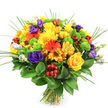 A vibrant, hand-crafted bouquet is displayed against a pristine white background, its colours and shapes immediately drawing the eye, much like a standout design in the window of Flowers Highgate. The arrangement is round, dense, and carefully balanced, celebrating a palette of joyful warm tones cooled by elegant purples and greens. At its heart, classic yellow roses open in tight, graceful spirals, surrounded by yellow chrysanthemums and smaller daisy-like blooms that cast a sunny glow through the design. Breaking up this golden field, bold orange gerbera daisies shine with wide, flat petals and contrasting darker centres, supported by smaller orange flowers that add depth and variation to the warm spectrum. Woven gently between the yellows and oranges, sumptuous purple lisianthus add sophistication, their layered petals reminiscent of miniature garden roses, while a few lavender-tinged buds soften the overall effect with a touch of romance. Dotting the bouquet, lime-green button chrysanthemums provide a playful, contemporary twist, their compact, spherical heads adding crisp texture and a refreshing burst of colour. Glossy clusters of ruby-red hypericum berries are strategically tucked among the blossoms, offering tiny sparks of contrast and a subtle festive feeling, ideal for celebrating milestones or sending congratulations around Highgate and its leafy avenues. The whole design is supported by a base of broad, dark green foliage, likely Ruscus, forming a lush, verdant collar that enhances the brightness above. Slender blades of ornamental grass rise and curve lightly, introducing airy movement and a sense of natural ease. The stems, neatly tied at the base, reveal a freshly prepared hand-tied bouquet, ready to bring colour, cheer, and a sense of abundant life to any Highgate home.