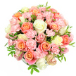 A softly domed bouquet of roses and spray carnations is shown against a bright white background, the pastel palette and rounded shape giving it a restful, graceful presence that feels at home in Highgate's leafy surroundings. The flowers are arranged in a tight, compact form that all but hides the underlying container, suggesting a low box or bowl cradling the blooms from beneath. At the forefront, fully opened roses reveal generous spirals of petals in peach, soft coral, and salmon pink, interspersed with creamy white and delicate pale-yellow roses that bring a gentle brightness to the design. Threaded among them, numerous small spray carnations in light pink cluster together, their many ruffled petals creating a feathery, cloud-like fill that adds texture and dimension. Slender green foliage, with its pointed leaves, appears in discreet glimpses between the blossoms, offering cool green highlights reminiscent of the quiet lanes and garden squares around Highgate Village. The lighting is clean and even, accentuating the smooth texture of each rose and the intricate, layered edges of the carnations without casting harsh shadows. This gentle yet luxurious bouquet carries an emotional tone of softness and reassurance-perfect for an intimate celebration, a thoughtful thank-you gift, or a tender gesture of sympathy delivered to a Highgate address. It is easy to picture this arrangement resting on a windowsill catching soft afternoon light, or on a dining table set for guests after a walk through nearby Highgate Wood, bringing indoors the sense of calm and natural beauty so characteristic of the area.