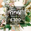 From Flowers Highgate, this elegant 'Florist Choice' bouquet is captured in a softly blurred backdrop of peachy cream. The bouquet's creamy white, full-petaled blooms dominate-likely garden roses, peonies, or chrysanthemums-their petals unfolding in lush tiers. They are interspersed with white spray blooms and tiny pale pink fillers that whisper rather than shout. The greenery is abundant: silvery eucalyptus leaves with their round, dusty-green shapes, slender olive branches adding a hint of Mediterranean air, and clusters of pale green star-buds or berries lending a fresh, almost botanical sparkle. The overall mood is refined, natural, and luxurious, as if the very freshest blooms were picked for a Highgate celebration.

Centered within the composition, a crisp white rectangular frame holds the inscription 'Florist Choice', with 'Florist' in elegant cursive white and 'CHOICE' in bold uppercase sans-serif just beneath. The price '?300' sits below in a bold white sans-serif style, unambiguous and confident. The background softens into warm peach tones, ensuring the flowers and foliage stay the focal point. The arrangement speaks of bespoke curation and the quiet confidence of a local florist crafting with care for Highgate customers, whether for birthdays, anniversaries, or a gesture of thanks.

Seen through the lens of a devoted Highgate florist, this image promises freshness, longevity, and the hush of a well-timed delivery. It conjures the feel of early-morning markets along Highgate High Street, the inviting warmth of Hampstead Heath nearby, and the sense that every stem has been chosen for texture and balance. For same-day delivery across Highgate and neighbouring districts, this Florist Choice bouquet embodies the craft and care you expect from a trusted local florist serving the area.