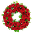 Near Highgate's leafy streets, this wreath holds a vivid, ceremonial energy. Dozens of deep red roses are packed into a dense circle, their velvety petals layered tightly to create a continuous ring that glows with warmth. Small clusters of bright green foliage-eucalyptus-like matte leaves and sharp, glossy ruscus-are tucked between the blooms, offering a fresh, verdant frame that makes the reds appear more luminous. The light in the image is bright and even, with soft reflections playing along the petal surfaces, giving the arrangement a tangible depth and almost sculptural presence. The white background isolates the piece, underscoring its solemn beauty and making it an ideal visual for memorial articles, funeral tributes, or remembrance features. This red-rose wreath is a classic language of condolence, symbolising love, respect, and enduring memory, and in Highgate it's routinely prepared by skilled florists for family, friends, and services at local chapels and churches. When you need a similar tribute delivered across Highgate, Muswell Hill, or Crouch End, your local Highgate florist can arrange same-day delivery with care and discretion, ensuring the circle remains pristine and ready to honour a life well-loved.