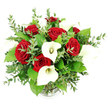 A richly romantic bouquet of deep red roses and pristine white calla lilies is set against a pure white background, creating a serene, gallery-like setting that showcases every flower as though it were a work of art. The image is taken from a slightly elevated, eye-level perspective, revealing the arrangement's full, domed shape and the meticulous way each stem has been placed, as if just finished on the bench at Flowers Highgate. At the centre, clusters of velvety crimson roses command attention, their petals layered in tight, spiralling formations that suggest passion, devotion, and carefully considered affection. Woven between the roses, tall, graceful calla lilies in crisp white rise and curve, their trumpet-shaped spathes unfolding around slender, creamy-yellow spadices, bringing a refined, contemporary elegance to the bouquet. Surrounding these focal blooms, a generous mix of greenery adds volume and natural movement. Slender eucalyptus stems carry small, rounded, silvery-green leaves that drift lightly through the arrangement, hinting at a cooling, herbal scent, while broader, darker green leaves anchor the design and enrich its overall silhouette. All the stems are gathered securely into a clear glass vase, whose subtly ribbed base is just visible at the very bottom of the frame, mostly concealed by the mass of foliage. Soft, even lighting enhances the contrast between the deep reds, luminous whites, and varied greens, while avoiding harsh shadows. The scene evokes a bouquet destined for an intimate dinner in Highgate Village, a romantic surprise for a home near Swains Lane, or a graceful focal point for a celebration close to Hampstead Heath, uniting timeless floral symbolism with the understated sophistication of North London living.
