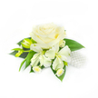 Set against a clean, luminous white background, this petite formal boutonnière or wrist corsage reads like a study in quiet refinement. The composition is anchored by a large, creamy white garden rose at its centre - petals densely layered and softly spiralled inward, the outer petals unfurling with a satin sheen that catches a cool, diffuse light. Below and to either side, several slender freesia blooms open gently, their trumpet-shaped petals pale and translucent, while a pair of elongated, yellowish-green freesia buds promise the next unfurling of fragrance and form. Narrow, deep green leaves frame the lower edge, their glossy texture and tapered points giving structure and a vivid contrast to the pale blossoms. Tucked discreetly to the right, a small cluster of lustrous white pearls nestles among the foliage like a string of tiny moonlit beads, introducing a classic bridal whisper to the piece. The overall impression is one of measured elegance-clean lines, soft volume, and a tactile interplay between velvety rose petals, smooth pearls, and crisp green leaves. Light is soft and even, letting the ivory tones and subtle shadows reveal the arrangement's depth without loud contrasts. Imagined for a groom's boutonnière, a bridesmaid's corsage, or an elegant guest at a Highgate celebration, this design conveys purity, restraint, and careful craftsmanship. It evokes the calm before vows and the refined neighbourhood gatherings around North Road and Muswell Hill, a small floral keepsake that reads as both tradition and tender attention to detail.