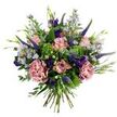 Set against a crisp white background, this hand-tied bouquet reads like a breezy Highgate meadow gathered at dawn. At its centre several antique-pink roses unfurl in stages-some tight buds, others partly open so their slightly deeper pink petal edges catch the light-offering a soft, classic perfume that suggests freshly opened blooms. Two full, dusty-rose carnations lend ruffled, tactile volume; their layered petals verge on watercolor softness. Upright spikes of deep indigo-veronica push upward through the group, providing strong vertical rhythm and a cool contrast that draws the eye. Scattered among them are small, dainty aster-like flowers in pale lavender-blue with tiny yellow centres, which breathe airiness and the impression of meadow grasses. Rich purple lisianthus (eustoma) buds and open blooms add jewel-toned punctuation, while rounded, silvery-green eucalyptus leaves and bright lime-green textural filler-reminiscent of santini or viburnum clusters-create a verdant, fresh underlayer. Slender green leaves and emerging buds tuck into the composition, reinforcing the bouquet's organic, hand-picked feeling. The stems are gathered and visible at the base, a clear sign of a hand-tied technique that lets each stem sit naturally rather than be forced into a formal shape. Lighting is soft and even, lifting the pastels while keeping the mood intimate and calm. The overall impression is one of quiet celebration: suitable for birthdays, thoughtful thank-you gestures, or to brighten a sitting room in Highgate or near Hampstead Heath. An experienced florist's touch is evident in the balancing of texture, colour, and scent, offering both visual charm and gentle, garden-fresh fragrance.