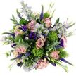 Seen from directly above, this bouquet forms a generous, almost cloud-like circle of flowers and foliage, its colours and textures standing out clearly against a simple white backdrop, as though displayed on a Highgate windowsill in soft daylight. At the centre, plush roses in shades of blush, antique pink, and gentle mauve open into layered spirals, their petals velvety and full, each bloom at the peak of its beauty. Nestled between them, airy clusters of lavender asters with small golden centres introduce lightness and a playful, meadowy feel, as if scattered by a breeze blowing across nearby Highgate Wood. Pockets of deep, velvety purple from lisianthus blooms add drama and sophistication, their petals softly curling like miniature ruffled bells, while graceful Veronica spikes in strong violet reach upwards, bringing movement and a slightly wilder touch to the arrangement. Dotting the spaces are compact, spherical tufts of bright chartreuse green-probably Green Trick dianthus or a similar textured flower-that give the design a modern, sculptural edge and provide a striking contrast to the soft petals. Threaded throughout are cool, silvery eucalyptus leaves whose smooth surfaces catch the light and whose muted tones offer a calming foil to the richer colours, suggesting a fresh, herbal scent mingling with the subtle sweetness of roses. Additional greenery and tiny buds fill any remaining gaps, making the bouquet feel abundant and carefully crafted without appearing rigid. The overall effect is one of relaxed elegance and heartfelt warmth, a bouquet well suited to same-day delivery around Highgate for birthdays, anniversaries, or simply bringing a touch of garden-inspired beauty into an N6 home.