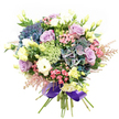 In the heart of Highgate, this exquisite bouquet sings with colour and gentle energy-an artful gathering that seems plucked from the rolling borders of Waterlow Park. Deep indigo and teal hydrangeas create a lush, voluminous base, their soft petals conjuring cloudlike sensations and a soothing, grounding charm. Cradled within, roses of lavender and creamy white open thoughtfully, their scent and layers whispering romance and gratitude. Tightly clustered ranunculus blooms in white and softly-yellow lisianthus add a fresh, springlike lift, their forms echoing the wildflowers that dot Highgate's wooded greens. Vivid fuchsia-pink filler flowers and ethereal pink astilbe sway gently around the core, dancing at the edges, while airy sprigs of intricately patterned green and white filler flowers nestle between, reminiscent of local meadows in bloom. Majestic, deep green foliage anchors the entire composition, which is completed by a wide, velvety purple satin ribbon, smartly tying every element together. Every detail reflects the care and passion of Highgate florists, making this bouquet a radiant choice for birthdays, heartfelt thanks, or enhancing a gathering with elegance and local warmth.